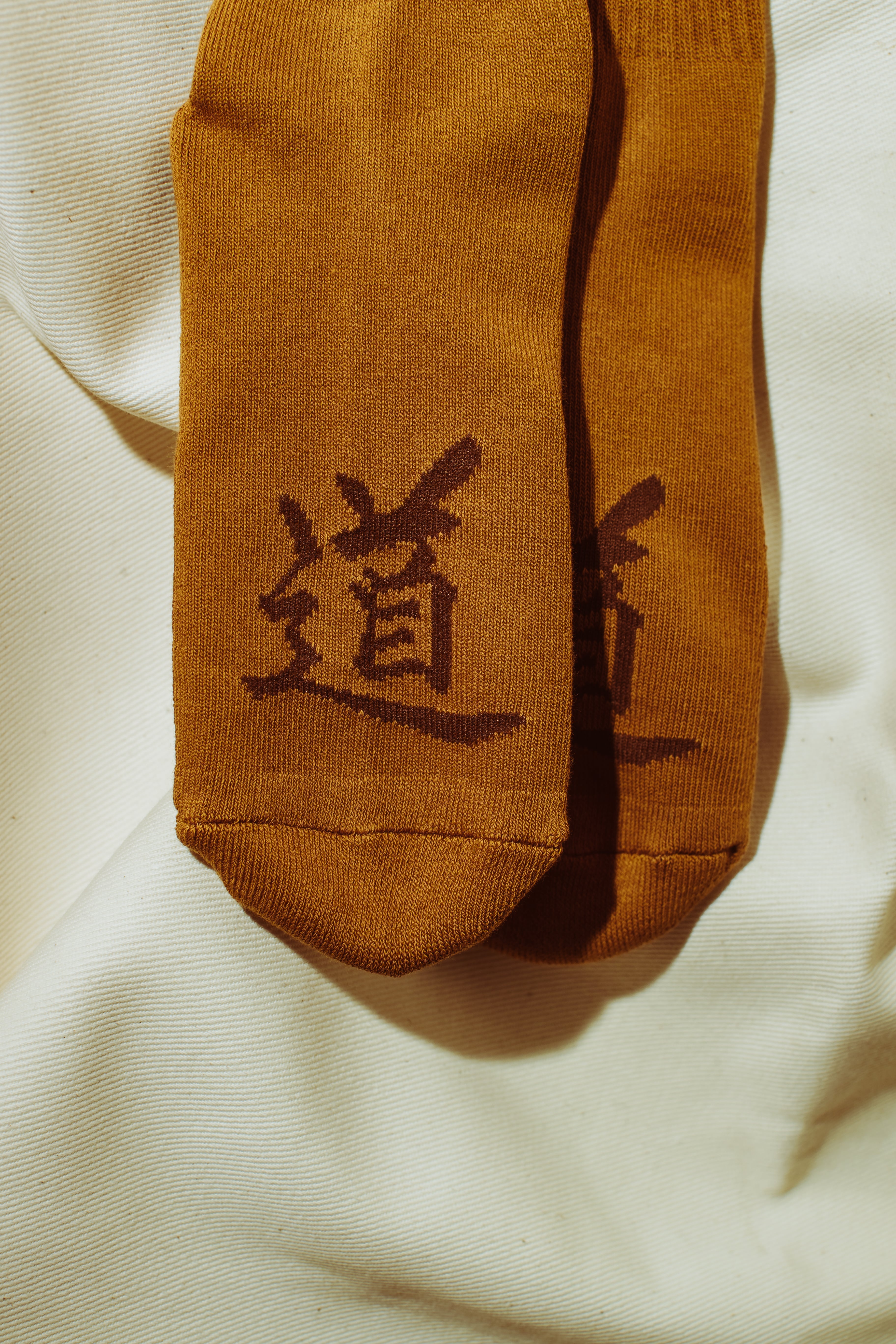 DJS2 TSUCHI Soil Clay Japanese-inspired designer socks folded display