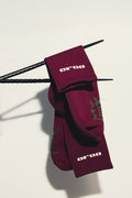 DOJO DJS1 AKA Red Earth premium crew socks flat lay on neutral surface