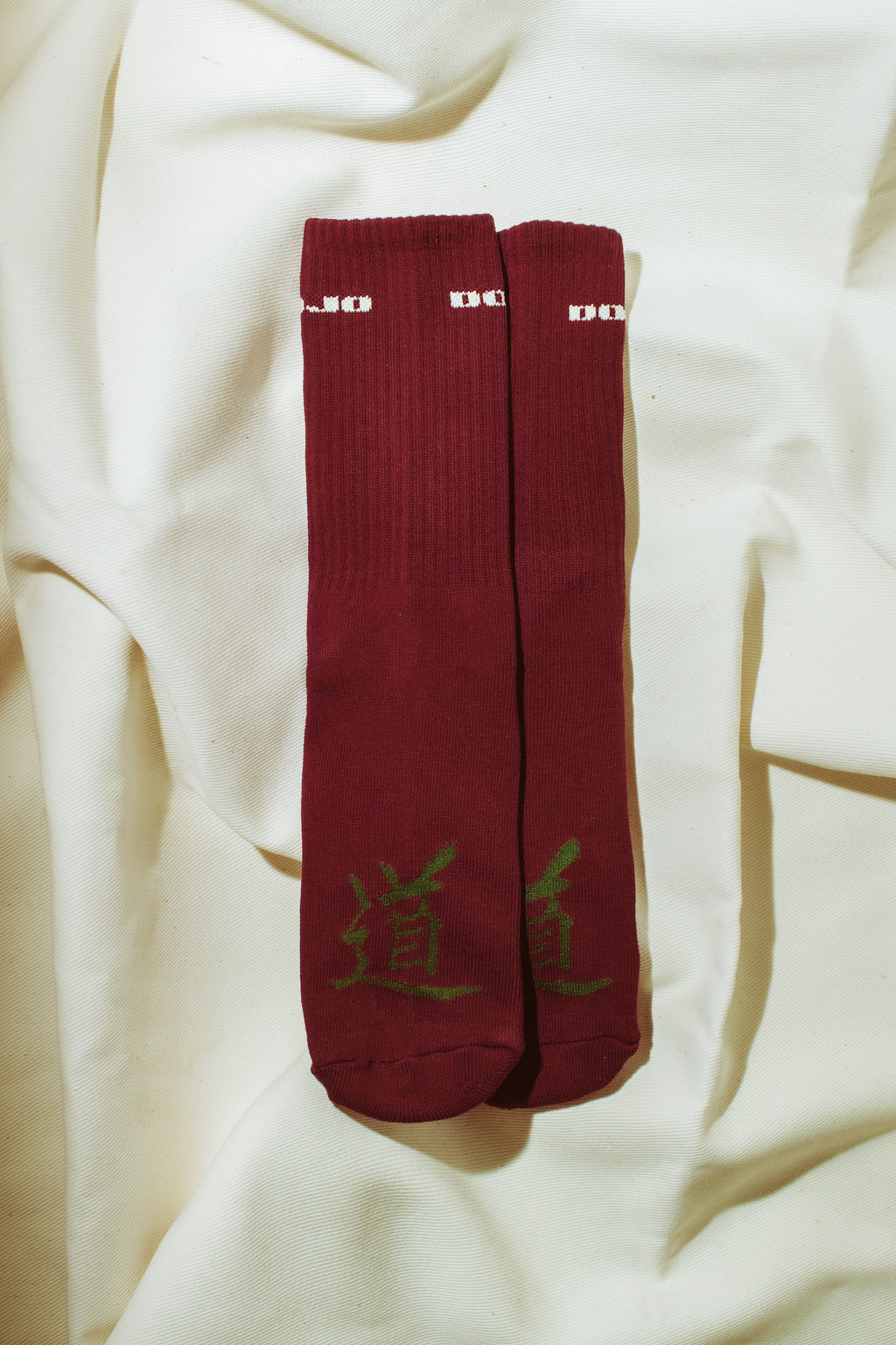 DOJO DJS1 AKA Red Earth quiet luxury socks side profile view