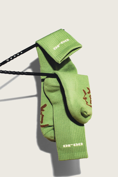 DOJO DJS3 MORI Forest premium crew socks flat lay on neutral surface