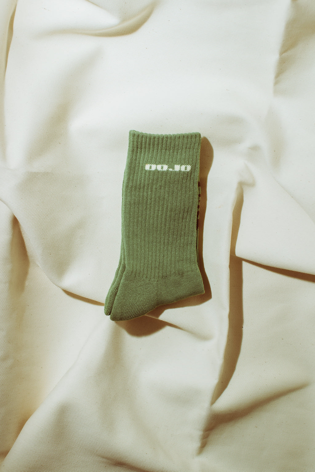 DOJO DJS3 MORI Forest quiet luxury socks side profile view